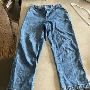 Blue, baggy jeans which were thirfted.